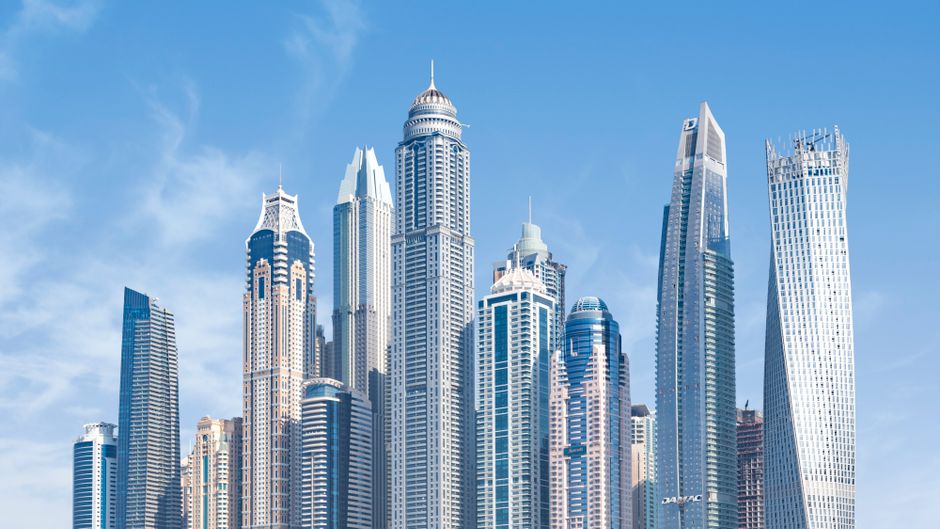 A professional meeting featuring ICC CEO Dominic Sims discussing UAE building safety standards.